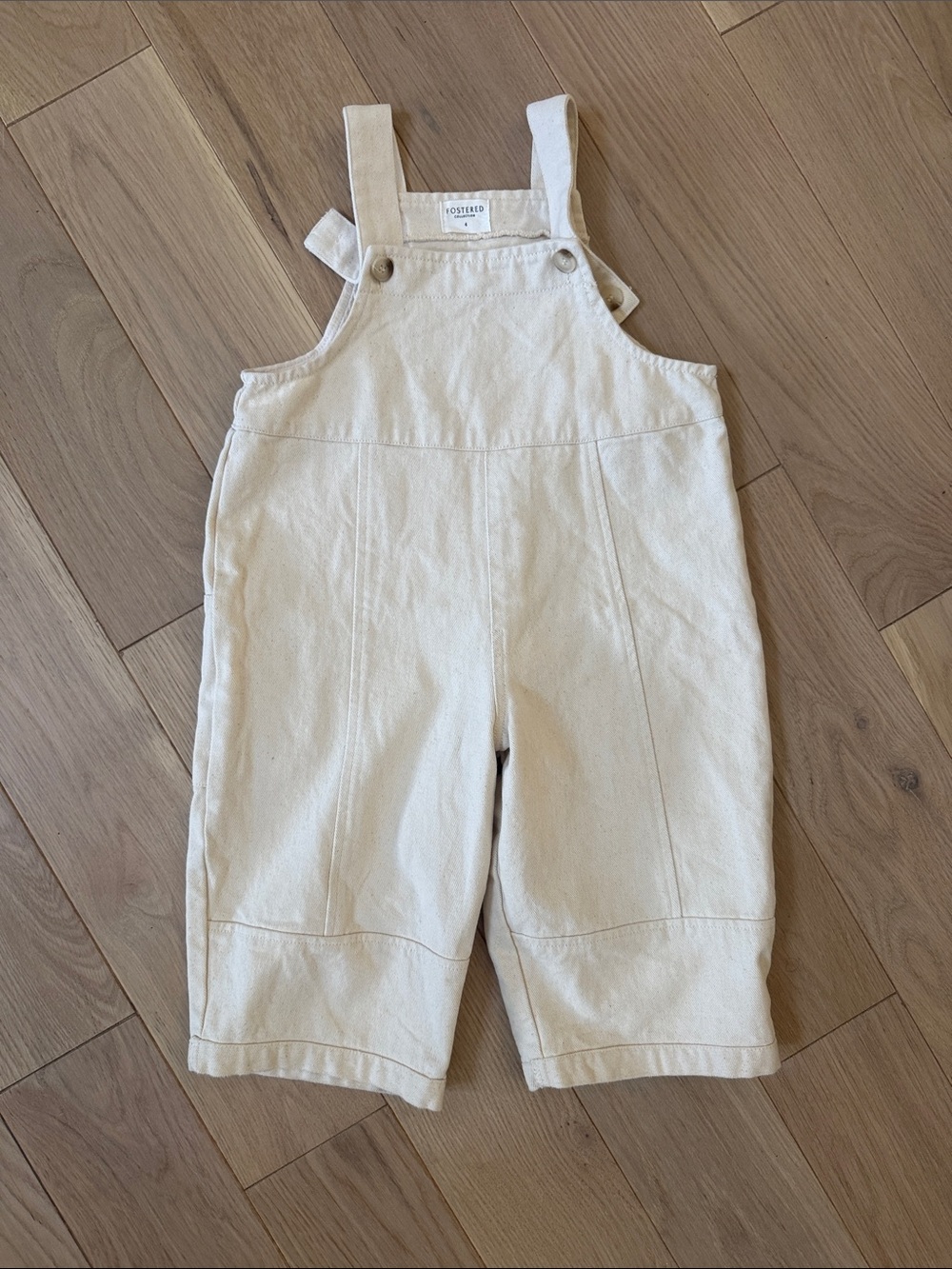 Fostered Collection Cream Kids Overalls with Adjustable Straps
